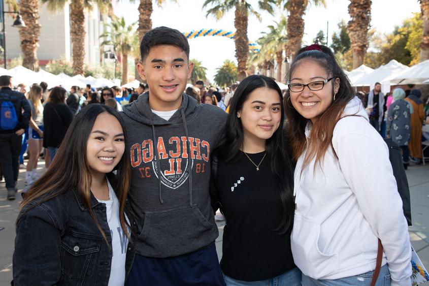 Admitted students enjoying their time on the Paseo with other students.